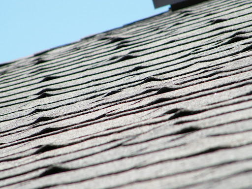 buckled roof shingles -Whonnock Roofing