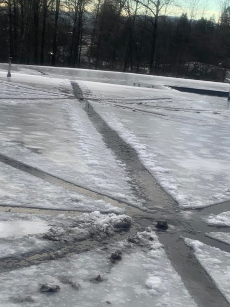 Creating drainage on an icy root