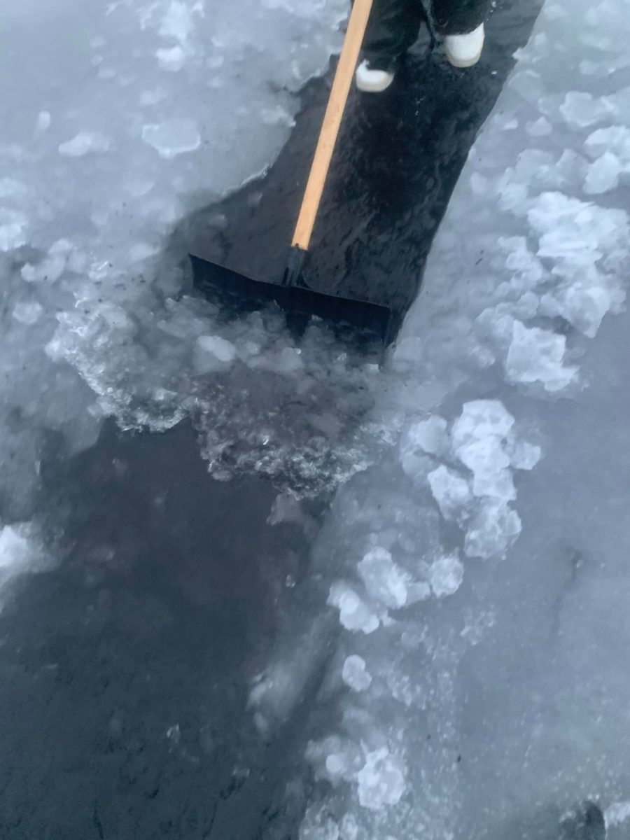 Creating drainage on an icy commercial roof